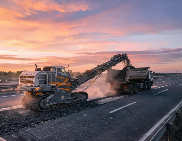 Wirtgen cold milling machine cutting asphalt on multi-lane highway